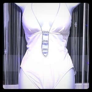 SO LO white and silver one piece.